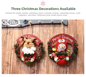 Detail of Christmas wreath with Santa and Snowman dolls on rustic wooden welcome wall