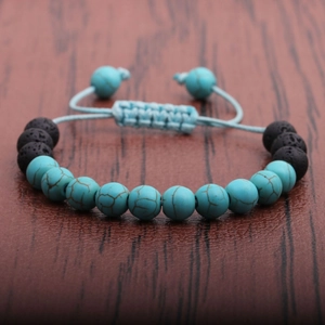 Braided adjustable kids bracelet with blue turquoise and black lava stone beads