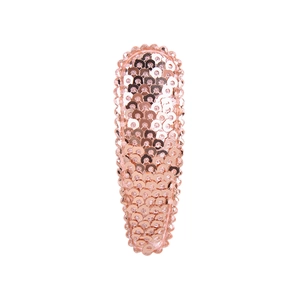 Close-up of rose gold flip sequin oval hair clip with shiny metallic texture detail