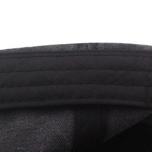 Black cotton baseball cap detail with multi-row reinforced stitching and twill texture