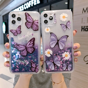 Detail of glitter liquid phone case with purple butterflies and white daisy patterns