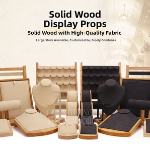 Detail of wooden jewelry display set with premium microfiber lining and wood base