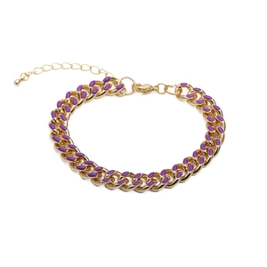 Macro shot of gold-plated Cuban link bracelet featuring purple enamel accents and metal links