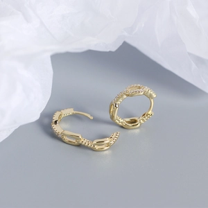 Detailed close-up of S925 sterling silver chain earrings with cubic zirconia inlay