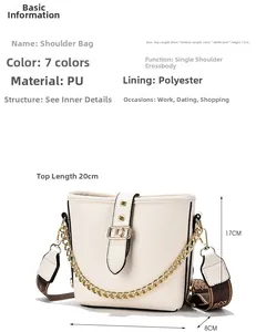 Tabella taglie borsa a secchiello in PU beige con misure e tracolla a catena metallica
