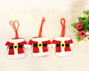 Three mini Santa clothing style Christmas cutlery holders made of red knitted fabric