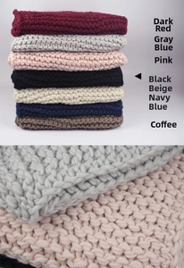 Detail of chunky knit textures and variety of seven colors for the warm winter scarf