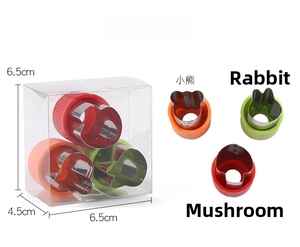 Macro detail of 3pcs stainless steel fruit cutters in bear rabbit and mushroom shapes