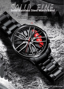 Close-up of racing wheel hub watch with stainless steel strap and red brake caliper