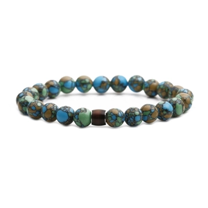 Macro shot of 8mm mood beads and natural stone texture bracelet with dark cylinder bead