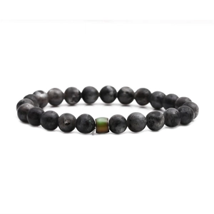 Detail view of thermochromic beaded bracelet with dark grey natural stone beads