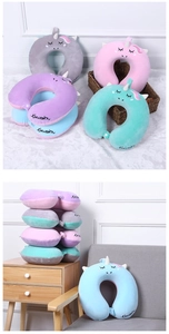 Detail of cartoon unicorn U-shaped travel neck pillow with soft embroidery and buckle