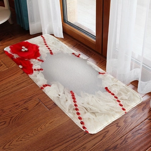 Close-up of long white flannel floor mat with 3D red floral and bead decorations