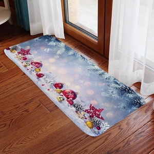 Detailed view of a festive Christmas flannel floor mat with snowflakes on wood flooring