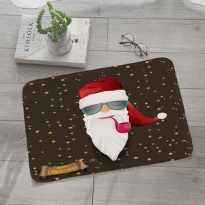 Flat lay of Christmas flannel rug with cool Santa on a grey wood floor