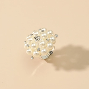 Adjustable silver flower ring featuring white faux pearls and sparkling rhinestones
