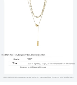 Double-layer titanium steel necklace detail with lucky bean and geometric metal pendant