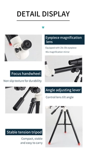 Detail of astronomical telescope with 20x 30x 40x eyepieces and adjustable tripod