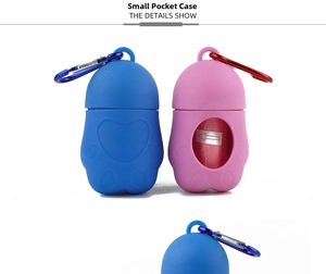 Detail of paw-shaped silicone pet waste bag dispenser with carabiner and refill roll