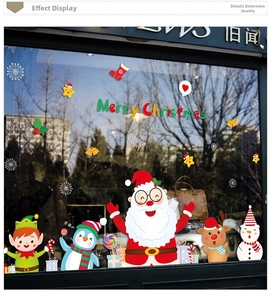 Detailed Christmas window stickers with Santa Claus, penguin, and Merry Christmas text
