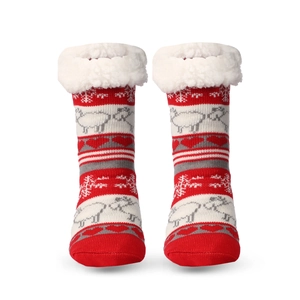 Detail of Christmas slippers socks with anti-slip dots and warm plush lining
