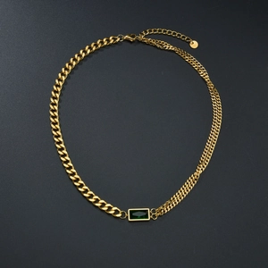 Double layered gold stainless steel necklace with asymmetric chain and green zircon stone