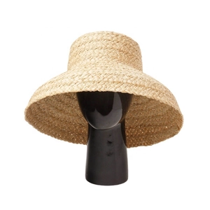 Elegant wide brim raffia straw hat for women with fine woven texture for summer sun protection