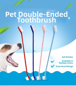 Close-up of dual-head pet toothbrush with soft bristles in four assorted colors