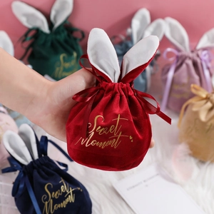 European velvet gift bags with bunny ears and Sweet Moment gold lettering in various colors