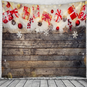 Detail of Christmas wall tapestry featuring festive gift boxes on vintage wood boards