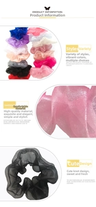 Detailed close-up of colorful organza scrunchies showing soft mesh fabric and diverse colors