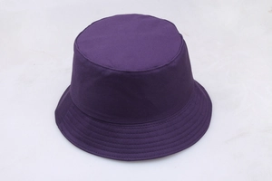 Detailed top-down view of a purple cotton fisherman hat featuring a cartoon print