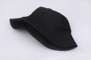 Detail view of the black cotton bucket hat with a basketball print and wide brim design
