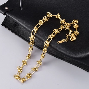 18K gold chunky link chain necklace with minimalist knot design and adjustable lobster clasp