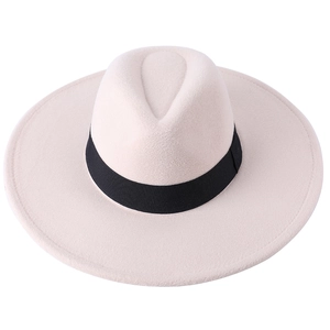 Detailed top view of a wide-brimmed beige wool fedora hat with a black ribbon band