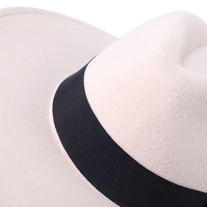 Close-up of wide brim wool jazz hat with elegant black grosgrain decorative band