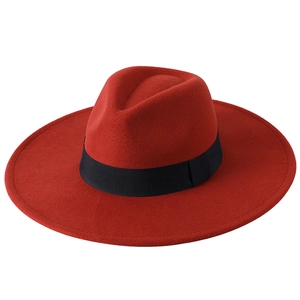 Detailed top view of red wool fedora with 9cm wide brim and black ribbon band