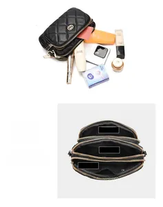 Detail view of multi-layer storage compartments in a black quilted crossbody bag
