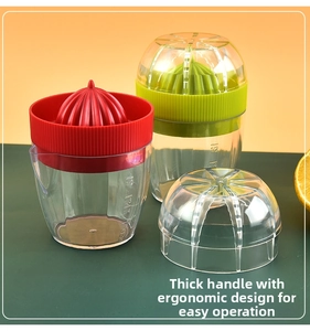 Manual lemon juicer with red and green tops, transparent scale cup and ergonomic handle