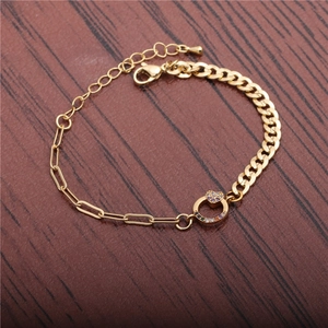 Gold curb and paperclip chain bracelet with a colorful zircon heart pendant