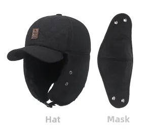 Detailed view of winter trapper hat with detachable mask and faux fur lining in black