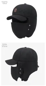 Detail of winter trapper hat with thick fleece lining, windproof fabric, and metal snaps