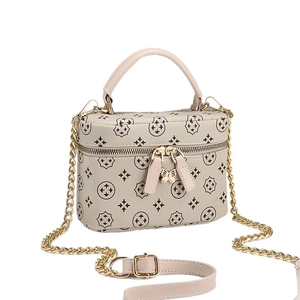 Sac bandoulière boîte beige en similicuir avec motif floral et zip papillon