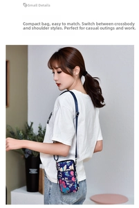 Close-up of a floral crossbody mini phone bag worn by a model in a lifestyle setting