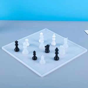 DIY silicone 3D chess set mold with resin pieces on a checkered board layout