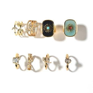 Set of 8 adjustable gold rings with natural stone patterns, star and moon designs