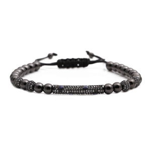 Adjustable evil eye braided bracelet with pavé zircon cylinder and gunmetal beads