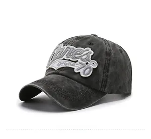 Vue latérale détaillée de la casquette grise délavée avec broderie vintage Canes 76