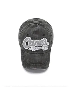 Vue de dessus d'une casquette en denim délavé gris foncé avec broderie Canes Original 70