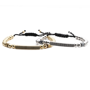 Adjustable woven bracelet set with gold and silver metal beads and black zircon bars